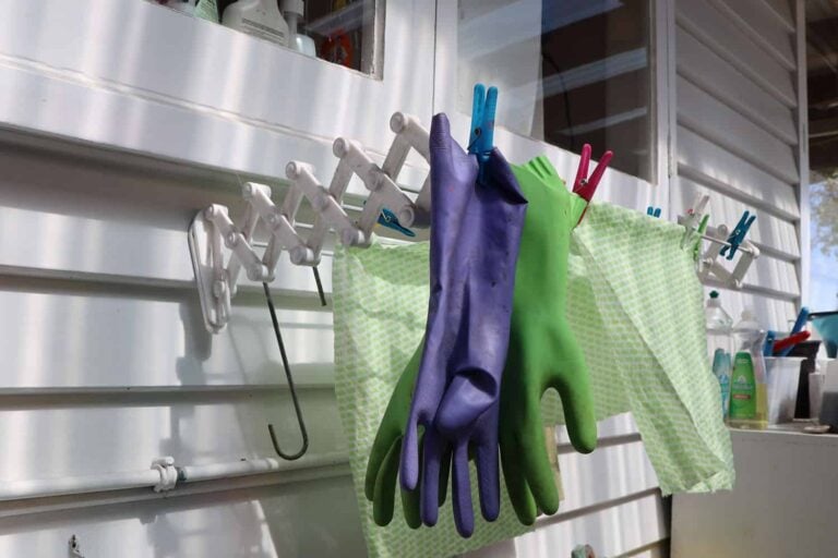 cleaning gloves and clothes hanging to dry