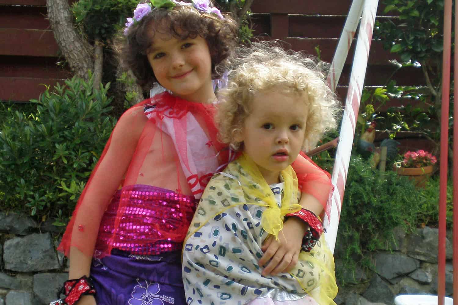 children playing with dress-ups/ costumes in home-based ECE