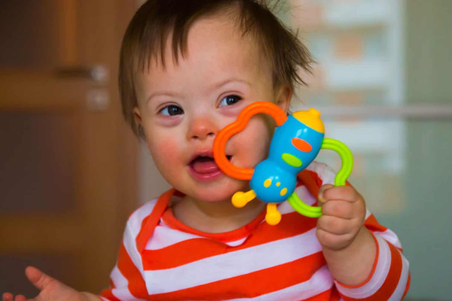 caring and teaching children with additional needs - image of down syndrome child