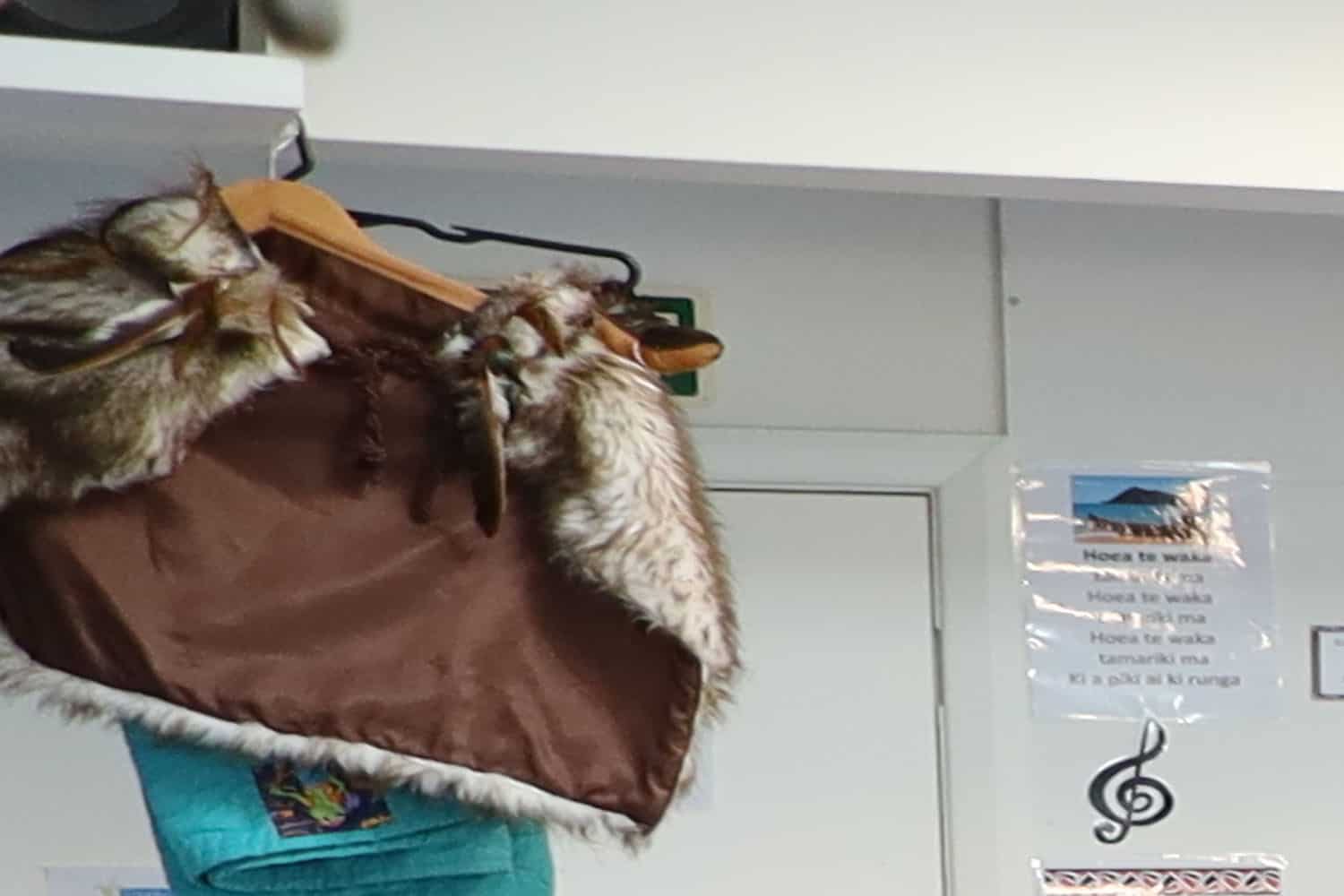 Child's Maori cape hanging at preschool