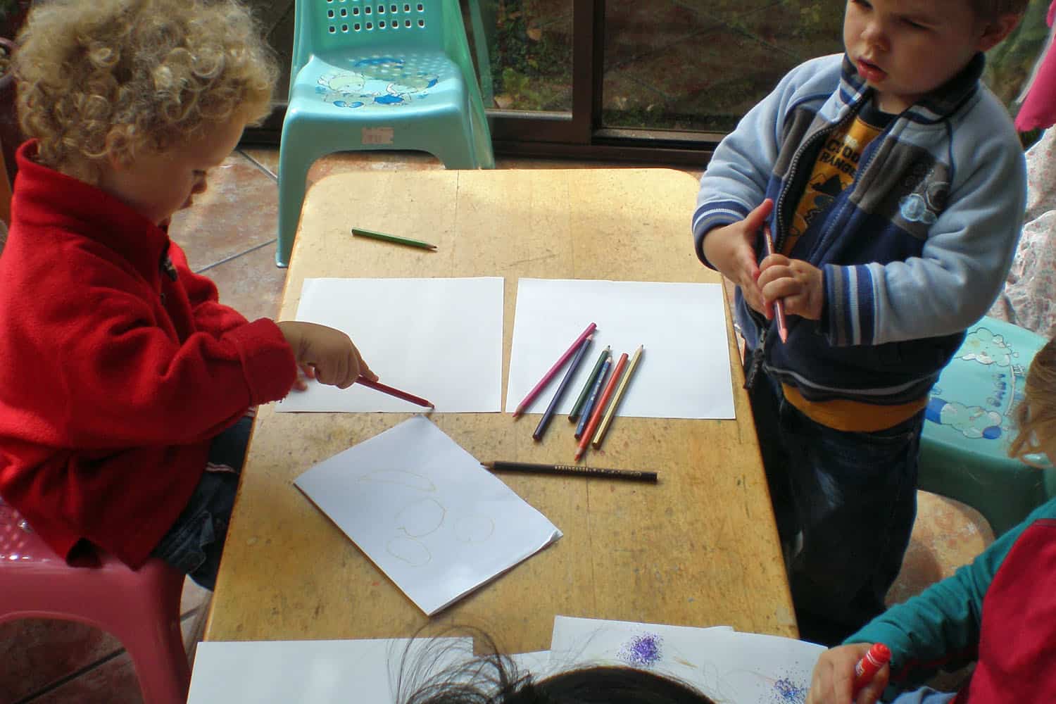 children writing drawing homebased